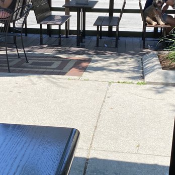 Milwaukee Brat House - Patio outside. See the cute little doggie? - German Near Me - Shorewood, Wisconsin
