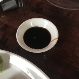 a plate of sushi and sauce a plate of sushi and sauce
