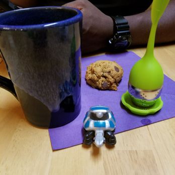 Riversong Inn Retreat - Our lil tortool friend enjoying a homemade vegan chocolate chip cookie and a cup of tea that's made by the inn's masseuse - Bed & Breakfast Near Me - Estes Park, Colorado Riversong Inn Retreat - Our lil tortool friend enjoying a homemade vegan chocolate chip cookie and a cup of tea that's made by the inn's masseuse - Bed & Breakfast Near Me - Estes Park, Colorado