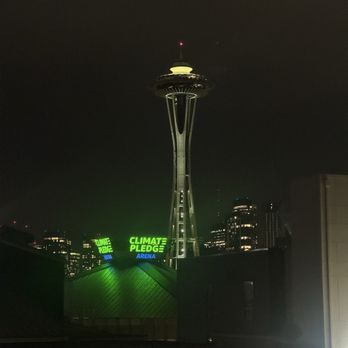 Mediterranean Inn - View of Space Needle from outdoor rooftop seating area - Hotels Near Me - Seattle, Washington Mediterranean Inn - View of Space Needle from outdoor rooftop seating area - Hotels Near Me - Seattle, Washington