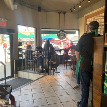 Starbucks - a man standing in front of a coffee shop - Coffee & Tea Near Me - Sidney, British Columbia Starbucks - a man standing in front of a coffee shop - Coffee & Tea Near Me - Sidney, British Columbia
