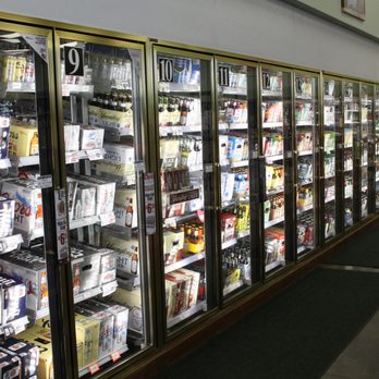 Chalet Party Shoppe - a row of beer coolers - Beer, Wine & Spirits Near Me - Elkhart, Indiana