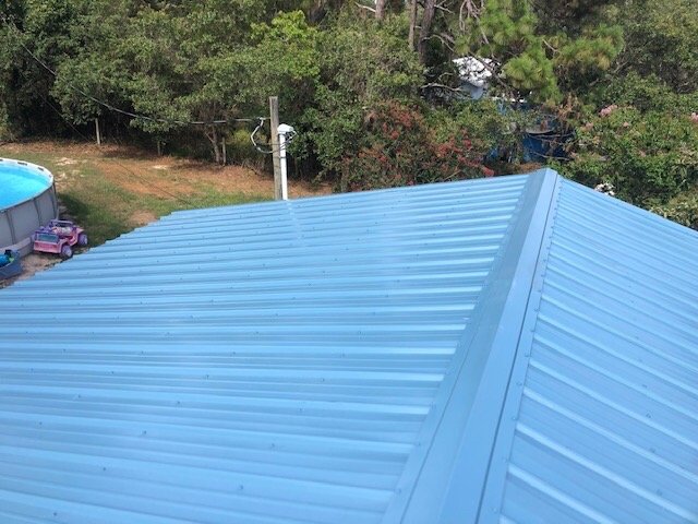 Slide of Quality First Roofing