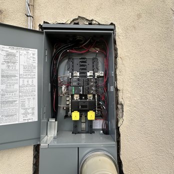 Genius Electric Power And Cabling  - New upgraded 200 AMP panel waiting for internal inspection. (Ignore my ugly original meter head) - Electricians Near Me
