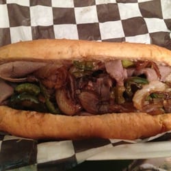 Curly's Food Truck - Italian beef sandwich with grilled onions and peppers, au jus