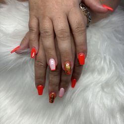 Nail Xcel Day Spa - Hot red nails