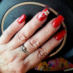Suri Nails - Even got flowers on my fingernails to match my toes. Y'all are the best!!!