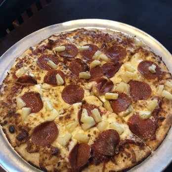 Sam's Place - Pepperoni and pineapple pizza - Sports Bars Near Me - Florence, Alabama
