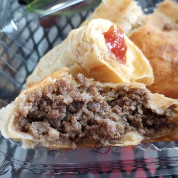 Milohas - Beef empanada (foreground), and guava finger behind it - Bakeries Near Me - San Jose, California Milohas - Beef empanada (foreground), and guava finger behind it - Bakeries Near Me - San Jose, California