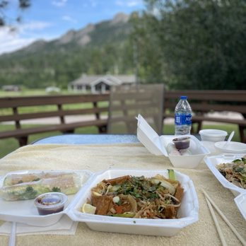 Pacific Rim Cafe - two takeout containers of food and a bottle of water - Vietnamese Near Me - Rapid City, South Dakota Pacific Rim Cafe - two takeout containers of food and a bottle of water - Vietnamese Near Me - Rapid City, South Dakota