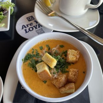 C Level - A cup of lobster bisque - New American Near Me - San Diego, California