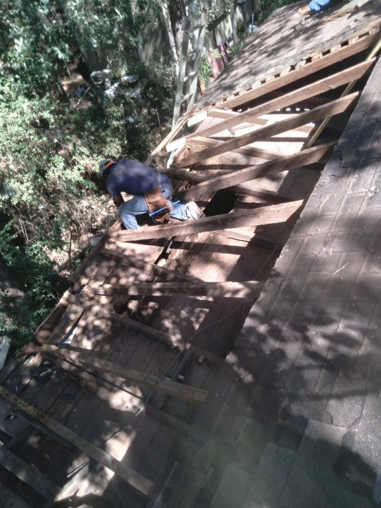 Slide of J&K Roofing Company