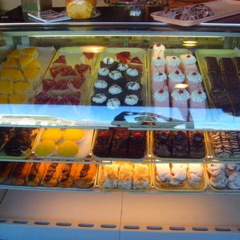 Olympos Bakery - there are 2 display cases of goodies: on the left is mostly Greek stuff, on the right (as pictured) is mostly American goodies. - Bakeries Near Me - Lowell, Massachusetts