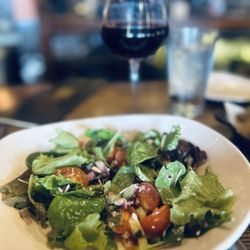 Fadó Irish Pub - Farmhouse Salad with amazing tangy vinaigrette. They do offer protein options as well!