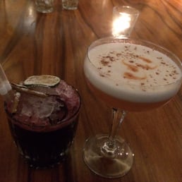 Drink with blueberry & vodka sour