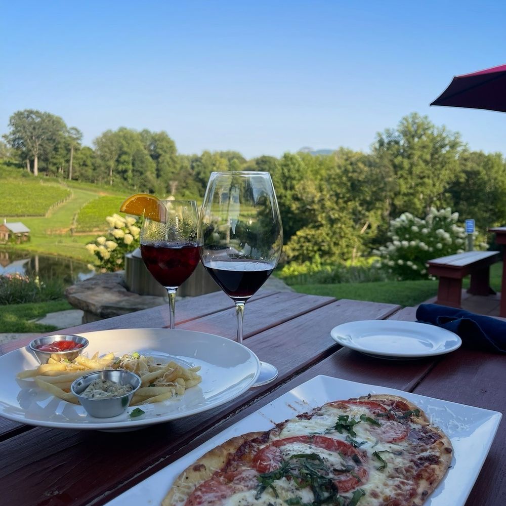 Jolo Winery & Vineyards - Margherita Flatbread pizza, pommes frites, outdoor seating with such a gorgeous view - Wineries Near Me - Pilot Mountain, North Carolina Jolo Winery & Vineyards - Margherita Flatbread pizza, pommes frites, outdoor seating with such a gorgeous view - Wineries Near Me - Pilot Mountain, North Carolina