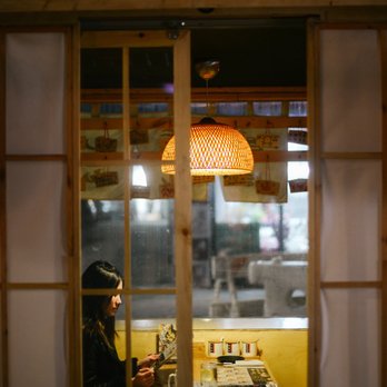 Kyuramen - Flushing - Outdoor Dining Booth with Customer - Ramen Near Me - Flushing, New York Kyuramen - Flushing - Outdoor Dining Booth with Customer - Ramen Near Me - Flushing, New York