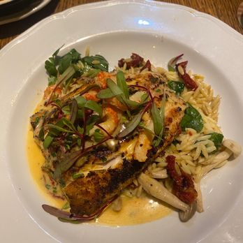 Ida Claire - Fish with crab meat over risotto - Southern Near Me - Addison, Texas