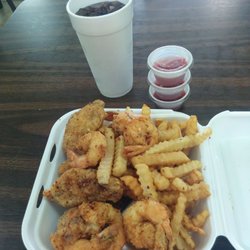 J & J Wings & Seafood - Six wings, six fried shrimp, French fries, and a drink.