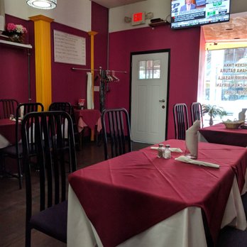 Bombay Sizzler - Maroon interior decor with one window near the front - Indian Near Me - Cambridge, Ontario