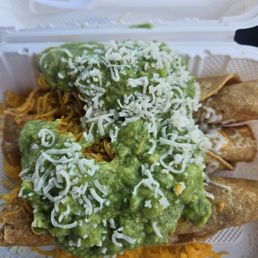 Taquitos with guacamole and cheese Taquitos with guacamole and cheese