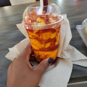 La Michoacana Azteca - a hand holding a plastic cup with a straw - Ice Cream & Frozen Yogurt Near Me - Orland Park, Illinois La Michoacana Azteca - a hand holding a plastic cup with a straw - Ice Cream & Frozen Yogurt Near Me - Orland Park, Illinois