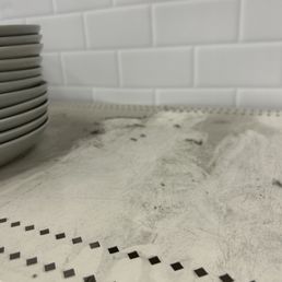 Gross levels of dust on multiple shelves