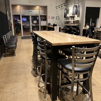 Loose Ends Brewing - a bar with stools and tables - Breweries Near Me - Centerville, Ohio