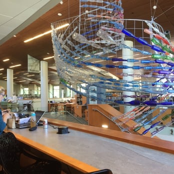 Walnut Creek Library - Bar style seating overlooking some modern artsy stuff that hangs over the stairway - Libraries Near Me - Walnut Creek, California Walnut Creek Library - Bar style seating overlooking some modern artsy stuff that hangs over the stairway - Libraries Near Me - Walnut Creek, California