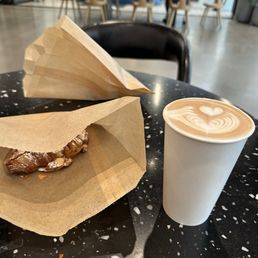 Almond croissant, and hot mocha Almond croissant, and hot mocha