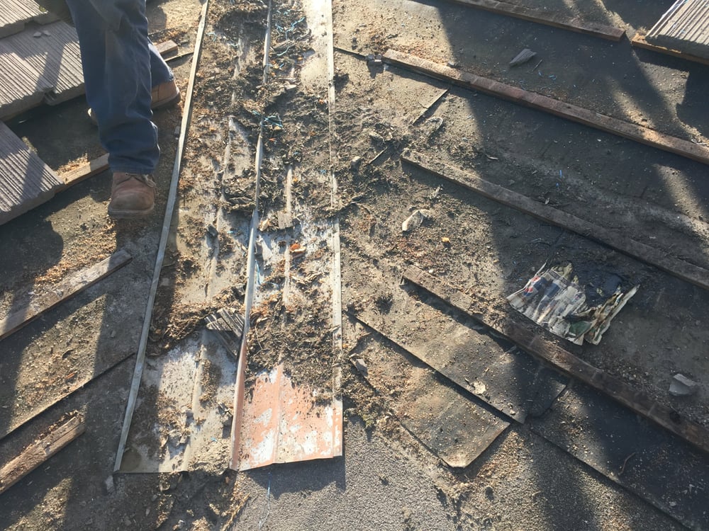 Slide of Dehart Roofing