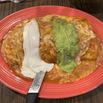 Burrito King - 98. The King Burrito Chorizo, Egg, Cheese, Beans, rice Potatoes Red Sauce w/ Sour Cream and Guacamole - Mexican Near Me - Madera, California Burrito King - 98. The King Burrito Chorizo, Egg, Cheese, Beans, rice Potatoes Red Sauce w/ Sour Cream and Guacamole - Mexican Near Me - Madera, California