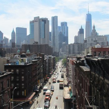 Manhattan Bridge - Manhattan streets below from pedestrian walkway (south side of bridge) - Landmarks & Historical Buildings Near Me Manhattan Bridge - Manhattan streets below from pedestrian walkway (south side of bridge) - Landmarks & Historical Buildings Near Me