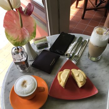 Raintree Bakery Coffeehouse - A delicious hot cappuccino, iced latte, and amazing lilikoi cheesecake. - Bakeries Near Me - Honolulu, Hawaii