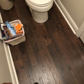 Prizm Construction - New waterproof floors for this half bath - General Contractors Near Me - New Orleans, Louisiana