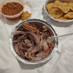 Nelly's Latin Restaurant - Dinner order of pernil and fried plantains. HUGE!