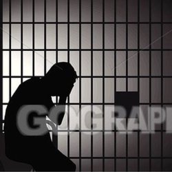 Man behind bars