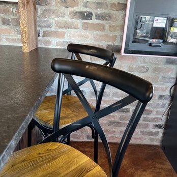 Pj's Pancake House - a brick wall and a counter with chairs - American Near Me - Lawrenceville, New Jersey Pj's Pancake House - a brick wall and a counter with chairs - American Near Me - Lawrenceville, New Jersey