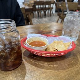 Complimentary chips and sauce Complimentary chips and sauce