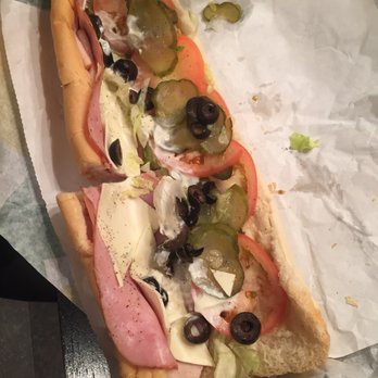 Subway - a sub sandwich on a piece of wax paper - Fast Food Near Me - Herriman, Utah