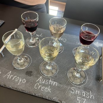 57&Vine - glasses of wine on a slate serving tray - Wineries Near Me - Quincy, Illinois