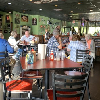 Como Smoke and Fire - Worn furniture and an eclectic decor makes this super casual spot a comfortable place for laid back dining. - Barbeque Near Me - Columbia, Missouri Como Smoke and Fire - Worn furniture and an eclectic decor makes this super casual spot a comfortable place for laid back dining. - Barbeque Near Me - Columbia, Missouri