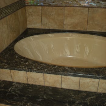 Malin Tile & Flooring - Tile work around the tub and steps - Flooring Near Me - Los Angeles, California