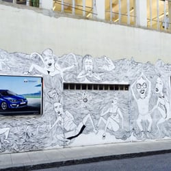 This mural in on the front wall... it was made by an artist working in the space...