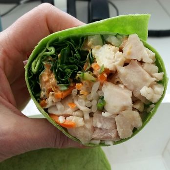 Megabites Deli - a hand holding a wrap of food - Delis Near Me - Renton, Washington Megabites Deli - a hand holding a wrap of food - Delis Near Me - Renton, Washington