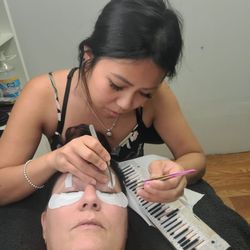 BAJ Nails and Day Spa - Natural full eyelashes putting put on
