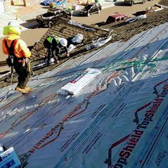 Slide of Axis Roofing