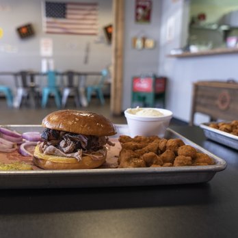 Texlahoma BBQ - two trays of food on a table - Barbeque Near Me - Edmond, Oklahoma Texlahoma BBQ - two trays of food on a table - Barbeque Near Me - Edmond, Oklahoma