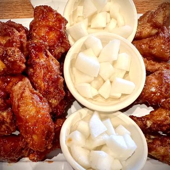 Bonchon Virginia Beach - 24 pc Wings: left is spicy, right is soy garlic flavor - Korean Near Me - Virginia Beach, Virginia Bonchon Virginia Beach - 24 pc Wings: left is spicy, right is soy garlic flavor - Korean Near Me - Virginia Beach, Virginia