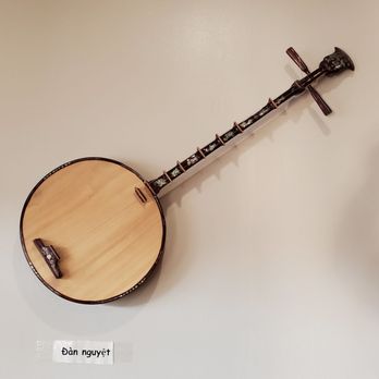 Saigon Pho - stringed instrument on the wall - Vietnamese Near Me - Raleigh, North Carolina Saigon Pho - stringed instrument on the wall - Vietnamese Near Me - Raleigh, North Carolina